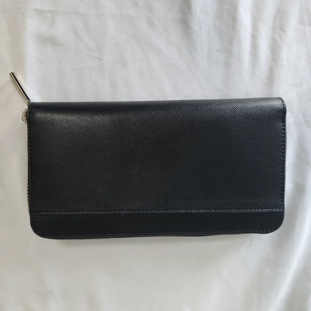 kate spade black zip-around saffiano wallet with gold logo